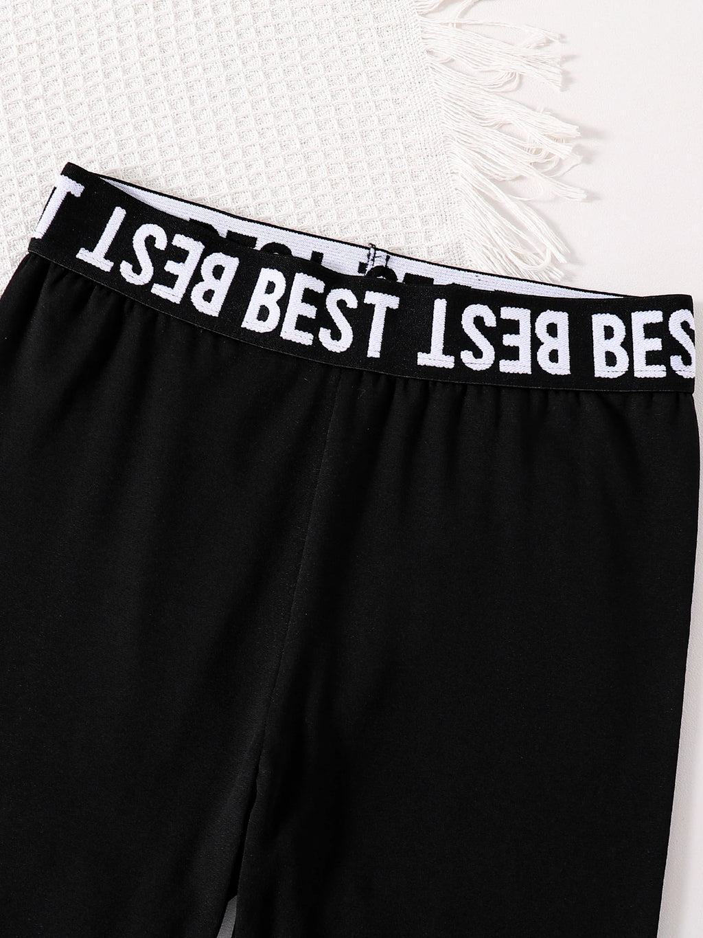 Children's clothing girls' fashion set with English printed round neck long sleeves and black slim fit pants 2-piece set