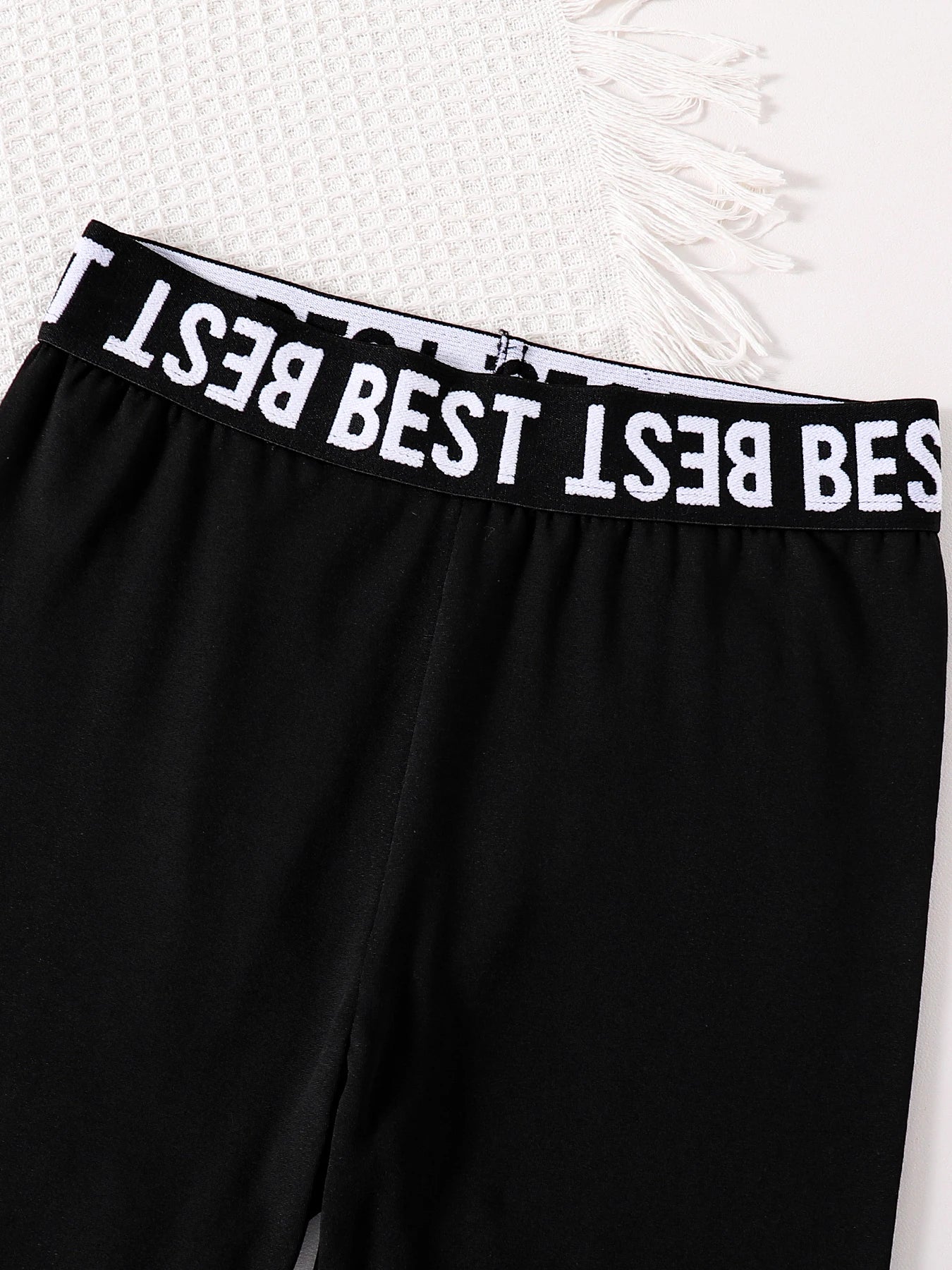 Children's clothing girls' fashion set with English printed round neck long sleeves and black slim fit pants 2-piece set